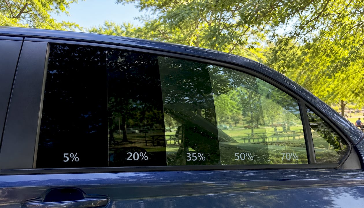 Sedan rear window with five tint shades compared