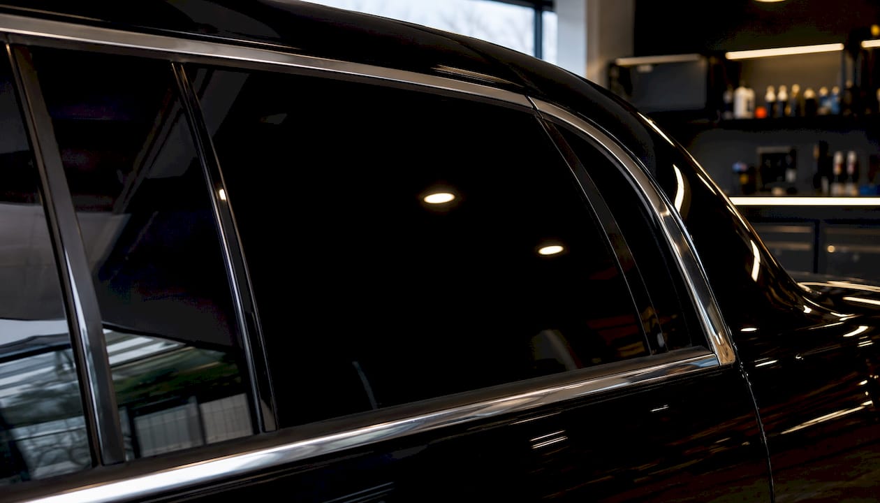Close-up limo window with ultra-dark tint
