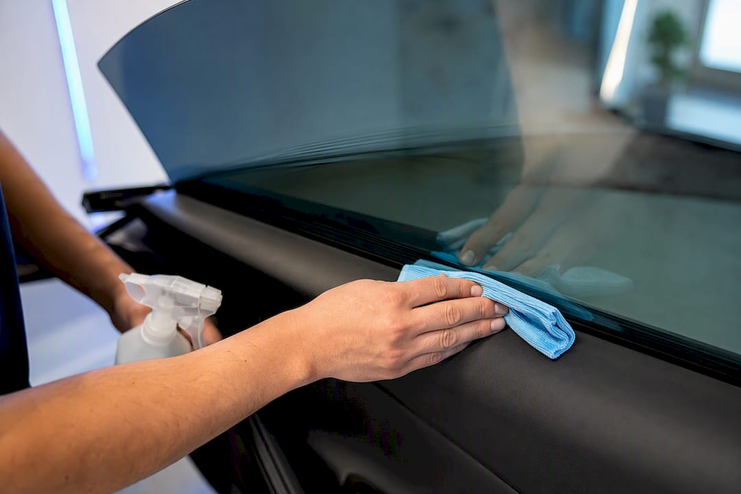 Microfiber cloth cleaning cured tinted glass