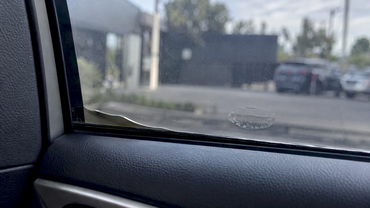 Small lift at the edge of car window tint